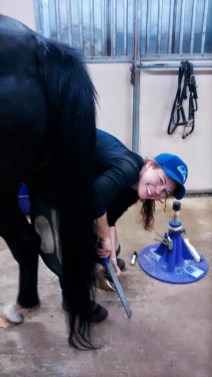 Angela trimming hind feet